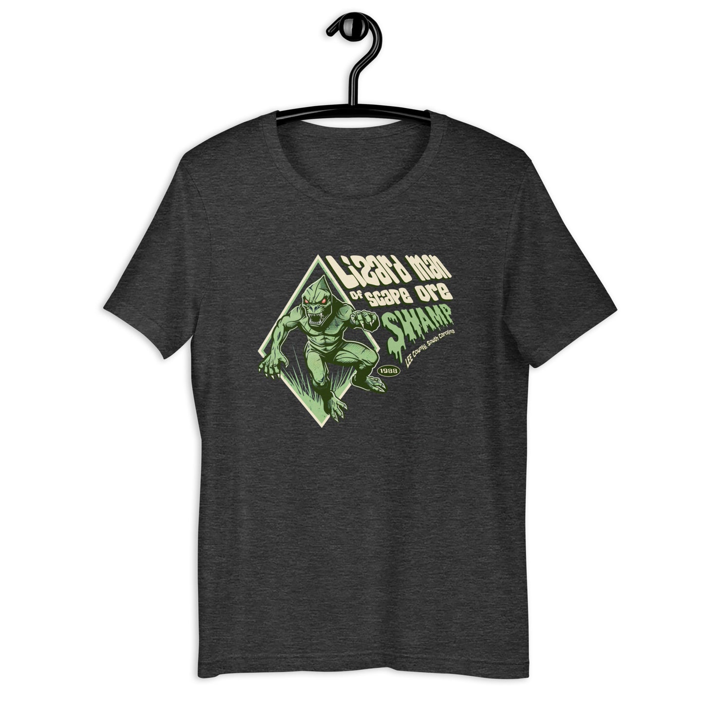 Show off your love for cryptids with our Lizard Man of Scape Ore Swamp t-shirt! Our original design captures the weirdness of this South Carolina legend. Get your hands on this unique cryptid clothing today.