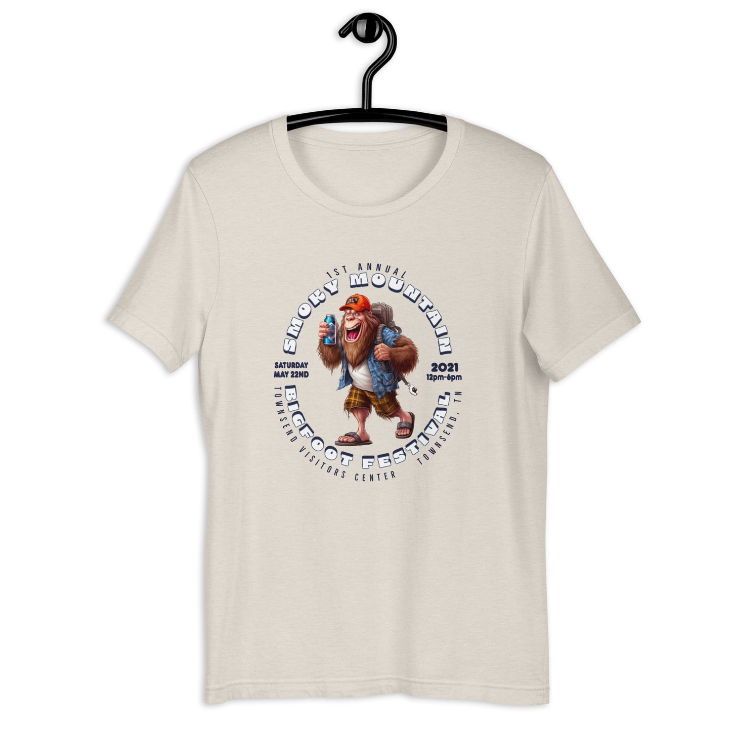 "Get your hands on our exclusive Smoky Mountain Bigfoot Festival 2021 t-shirt! Featuring a cool cryptid design, this bigfoot t-shirt is perfect for any bigfoot enthusiast. Show off your love for the infamous creature with our limited edition bigfoot clothing. Shop now and add this must-have bigfoot apparel to your collection!"
