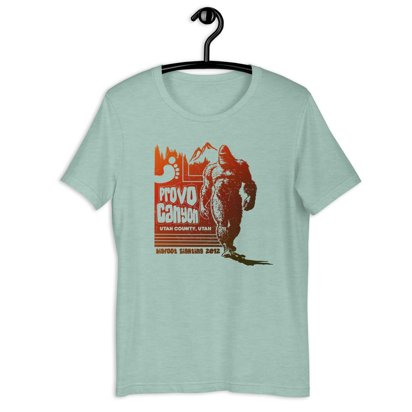 If you're a big fan of Bigfoot, this is the t-shirt for you! Our Provo Canyon Bigfoot t-shirt is not only stylish but also a conversation starter. Add this cryptid t-shirt to your wardrobe and express your love for the weird and wonderful.