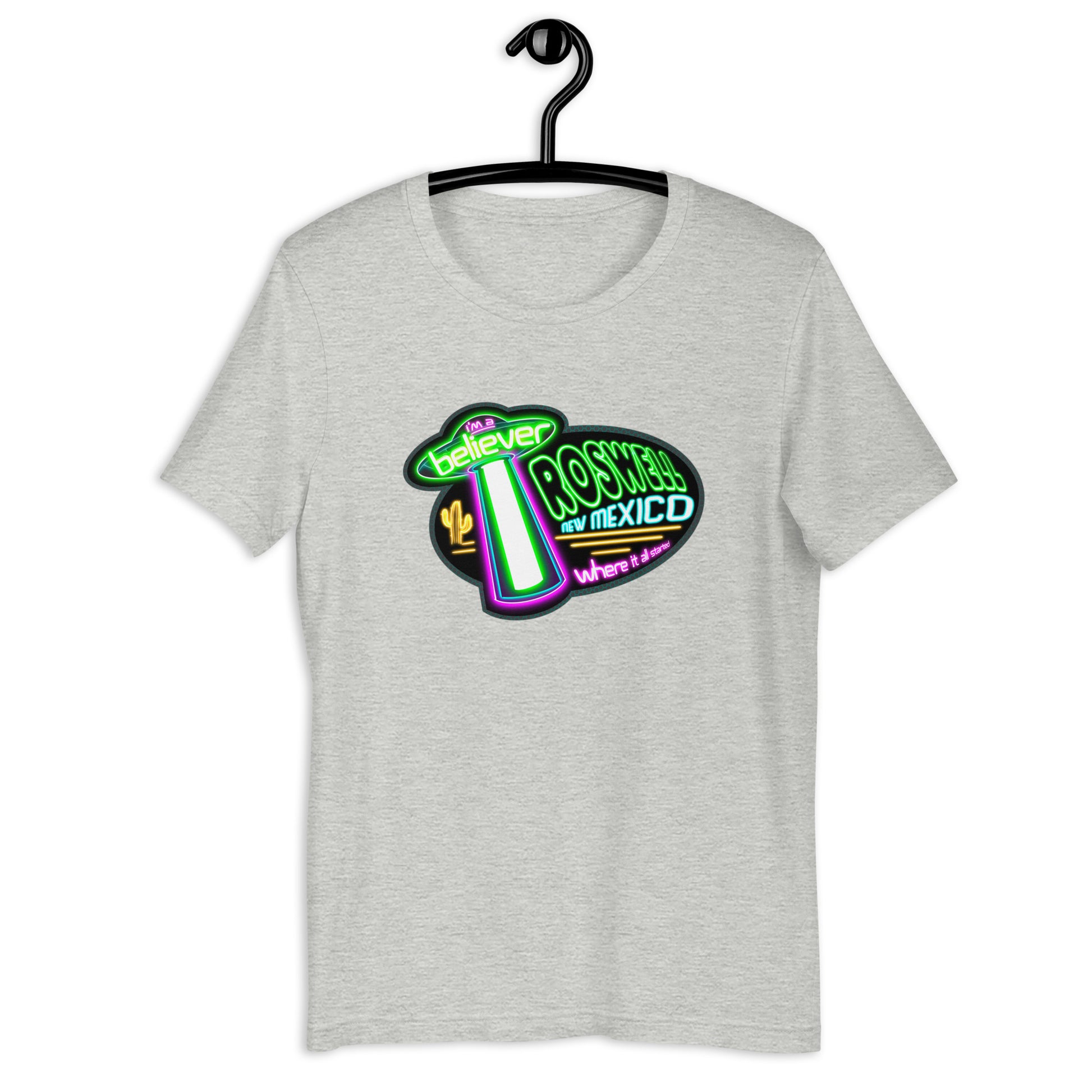 Don't miss out on this wacky Neon Roswell t-shirt! If you're into UFOs and aliens, this original design is perfect for you! The tee boasts a vibrant design that's sure to turn heads. Wear it with pride and add some weirdness to your wardrobe!