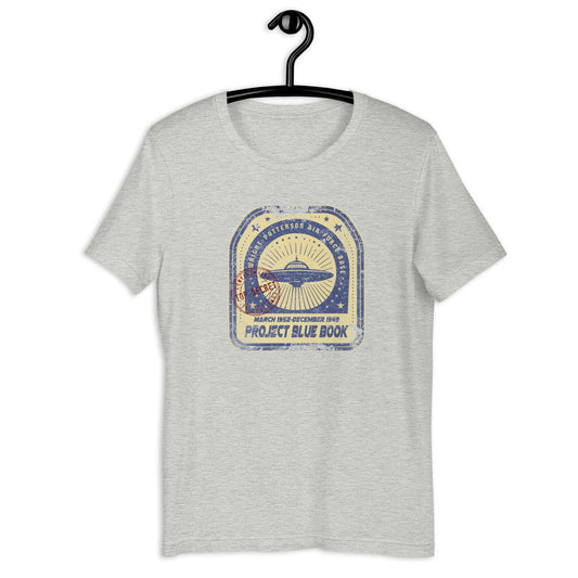 Add some intrigue to your wardrobe with our original Project Blue Book t-shirt. Featuring a weird and wonderful design of a UFO, this t-shirt is perfect for conspiracy theorists and those interested in all things extraterrestrial. It's a unique addition to your collection of Ufo clothing.