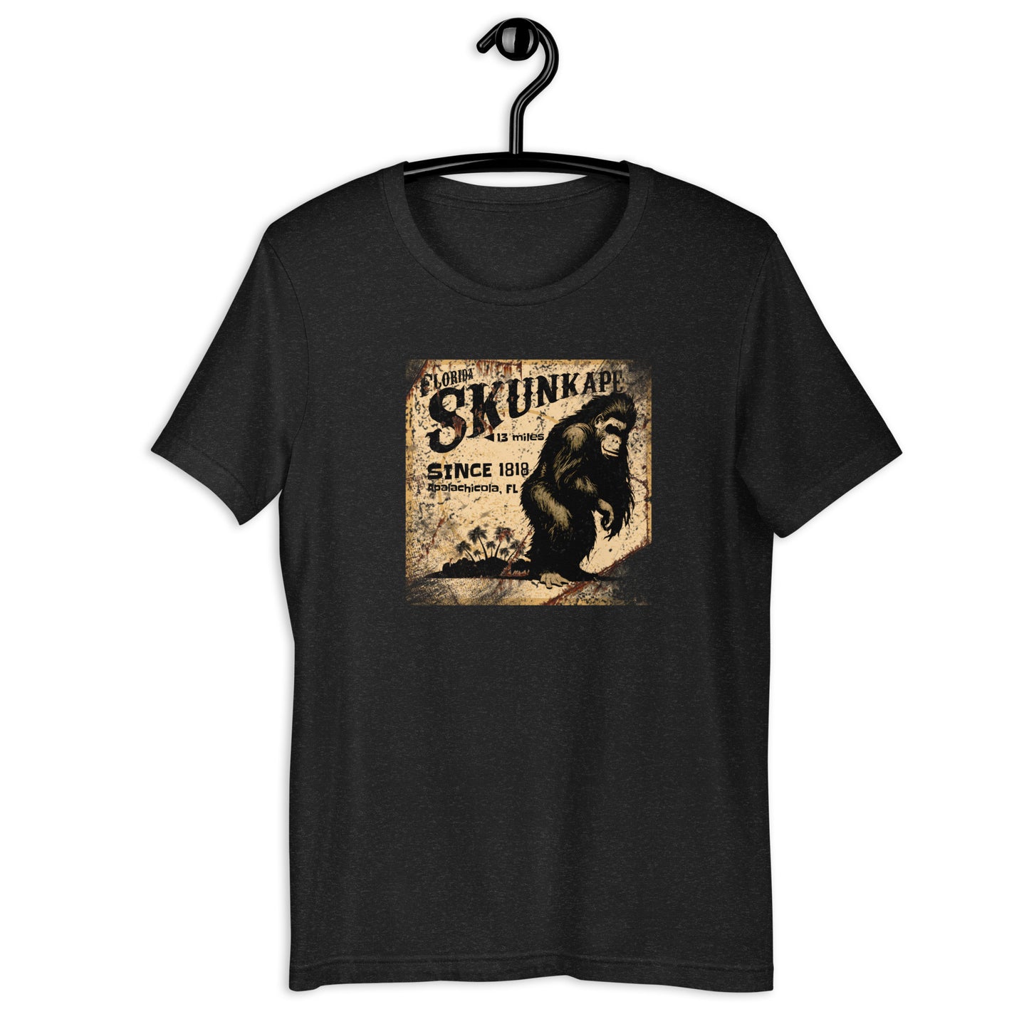 If you're a fan of cryptids and Florida folklore, you'll love the 1818 Skunk Ape cryptid t-shirt. Crafted from the highest-quality materials, this skunk ape t-shirt is both comfortable and durable. Whether you're on the hunt for the elusive creature or just want to show off your love for the legend, this cryptid apparel is the perfect choice. Invest in a piece of Florida history and order your t-shirt today!