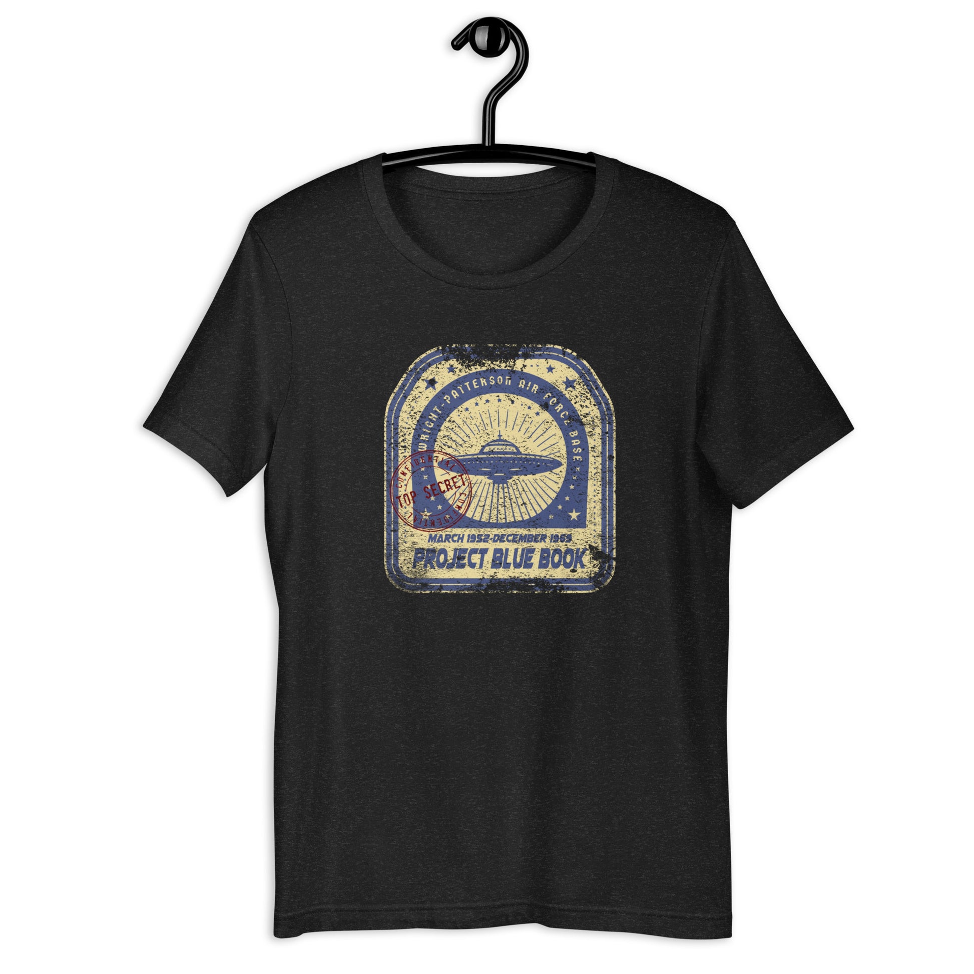 Add some intrigue to your wardrobe with our original Project Blue Book t-shirt. Featuring a weird and wonderful design of a UFO, this t-shirt is perfect for conspiracy theorists and those interested in all things extraterrestrial. It's a unique addition to your collection of Ufo clothing.