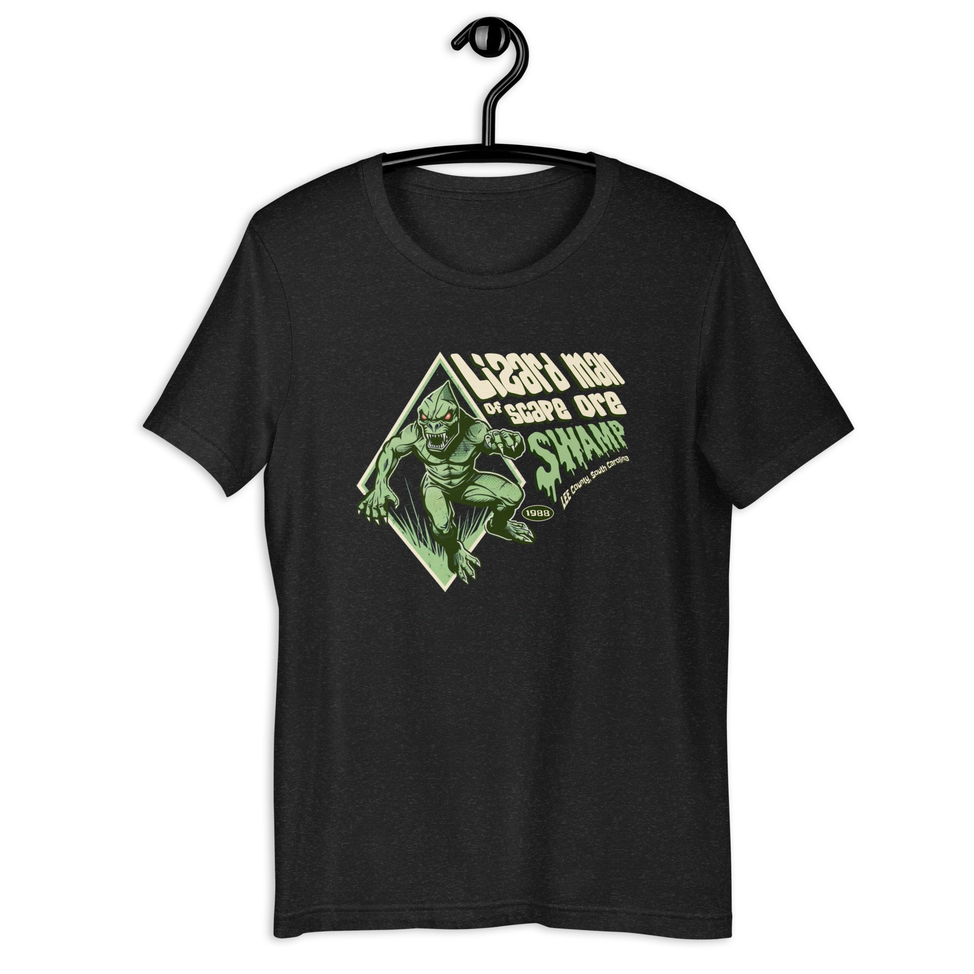 Show off your love for cryptids with our Lizard Man of Scape Ore Swamp t-shirt! Our original design captures the weirdness of this South Carolina legend. Get your hands on this unique cryptid clothing today. 