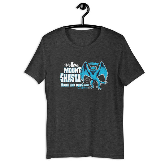 Show off your love for the strange and unusual with our Batsquatch Mt Shasta t-shirt! Featuring an original design, this weird t-shirt is the perfect addition to any cryptid clothing collection. Represent Washington's famous cryptid in style with our cryptid apparel.