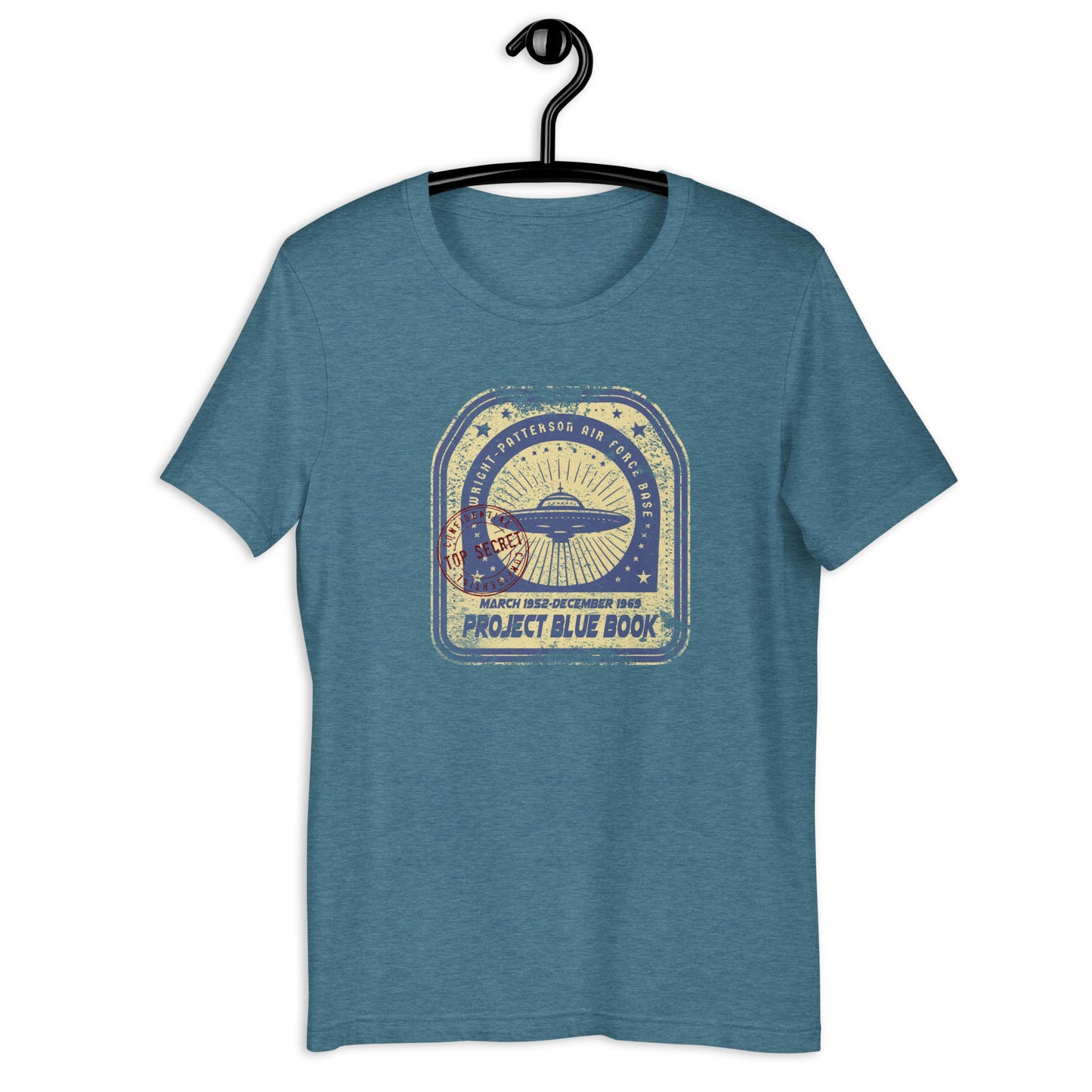 Add some intrigue to your wardrobe with our original Project Blue Book t-shirt. Featuring a weird and wonderful design of a UFO, this t-shirt is perfect for conspiracy theorists and those interested in all things extraterrestrial. It's a unique addition to your collection of Ufo clothing.