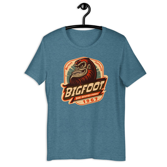 Show off your love for all things cryptid with our original design Bigfoot 1967 t-shirt! Perfect for any California local or fan of the strange and weird. Join the hunt for Sasquatch in style with our high-quality, comfortable cryptid apparel.