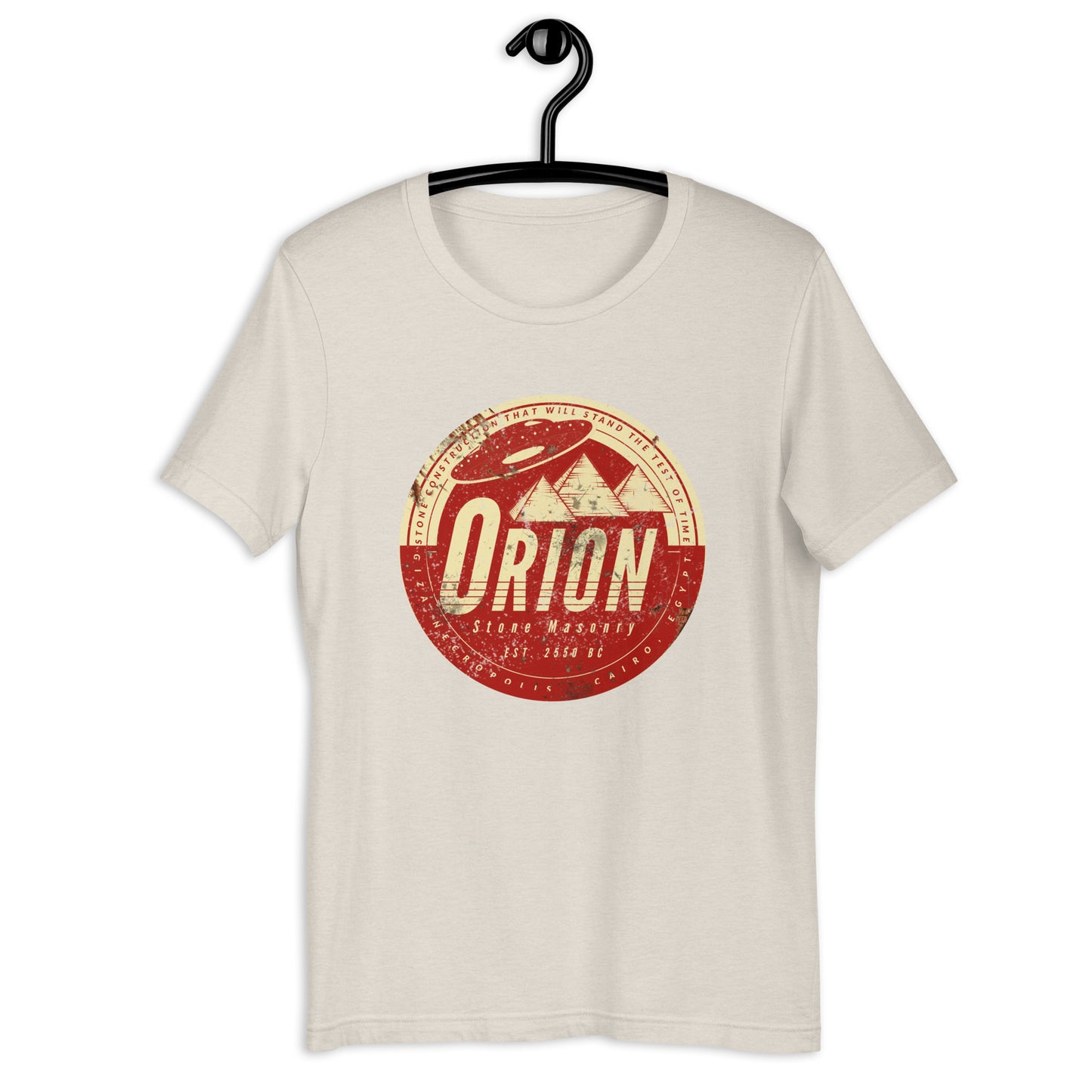 Looking for something out of this world? Look no further than Orion Stone Masonry's Egyptian t-shirt featuring a UFO hovering over a pyramid! Our high-quality, soft cotton t-shirt is the ultimate UFO apparel for anyone who dreams about space. Shop now and make a statement with this original design.