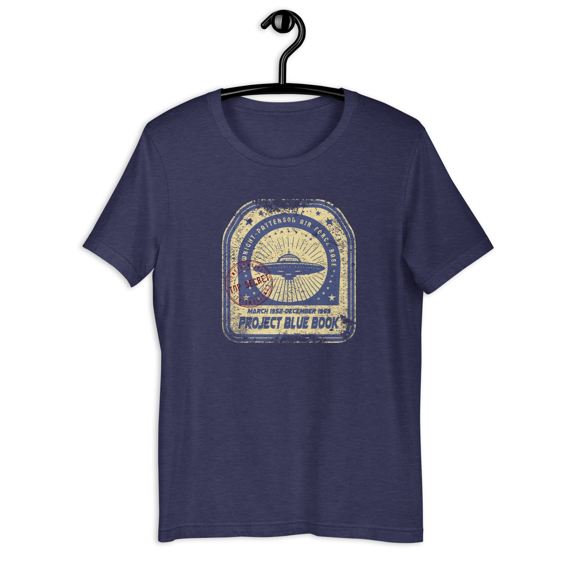 Add some intrigue to your wardrobe with our original Project Blue Book t-shirt. Featuring a weird and wonderful design of a UFO, this t-shirt is perfect for conspiracy theorists and those interested in all things extraterrestrial. It's a unique addition to your collection of Ufo clothing.