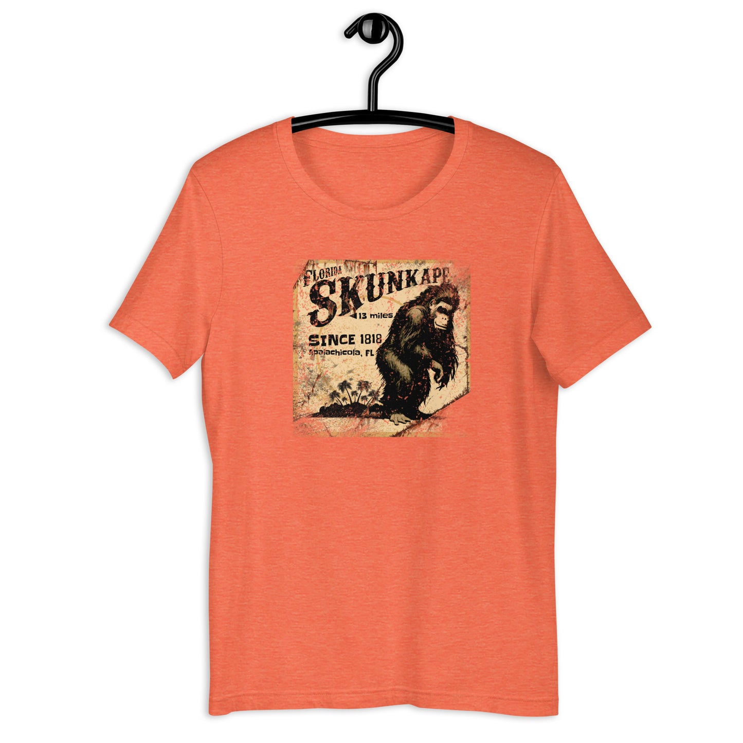 If you're a fan of cryptids and Florida folklore, you'll love the 1818 Skunk Ape cryptid t-shirt. Crafted from the highest-quality materials, this skunk ape t-shirt is both comfortable and durable. Whether you're on the hunt for the elusive creature or just want to show off your love for the legend, this cryptid apparel is the perfect choice. Invest in a piece of Florida history and order your t-shirt today!