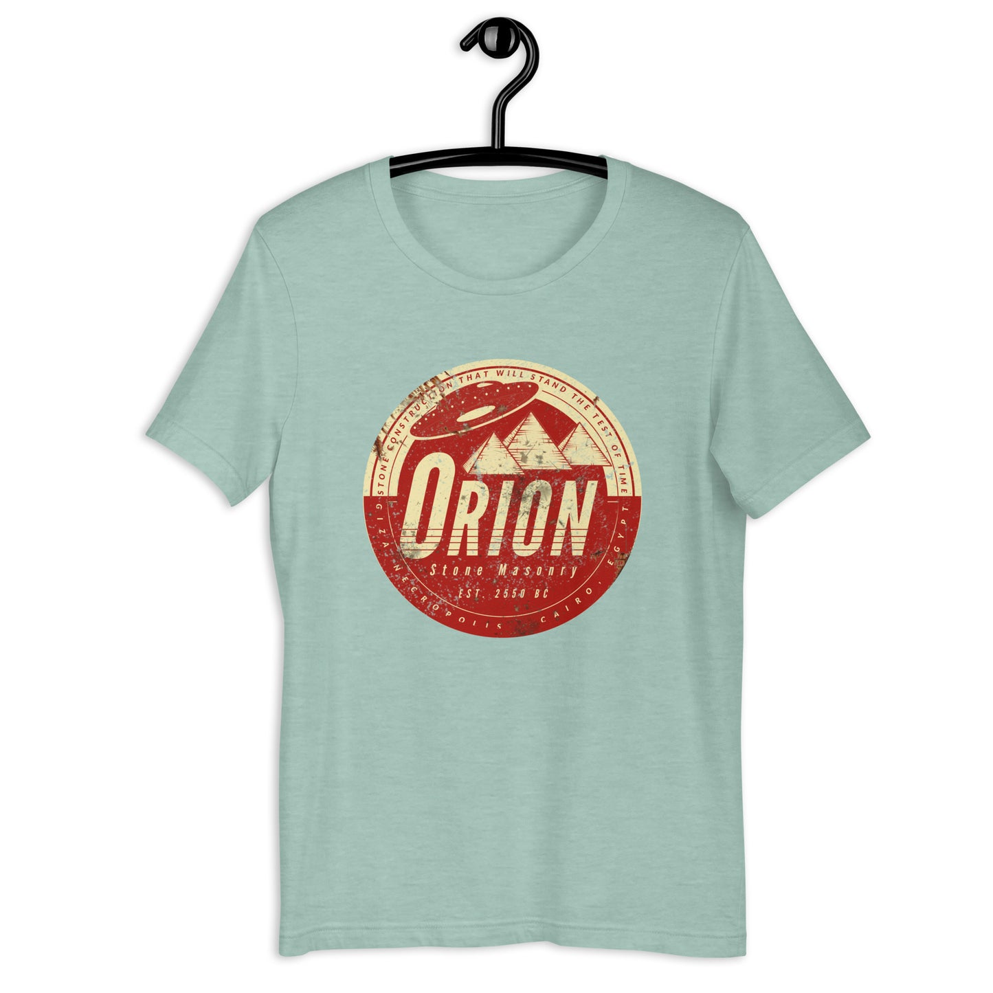 Looking for something out of this world? Look no further than Orion Stone Masonry's Egyptian t-shirt featuring a UFO hovering over a pyramid! Our high-quality, soft cotton t-shirt is the ultimate UFO apparel for anyone who dreams about space. Shop now and make a statement with this original design.