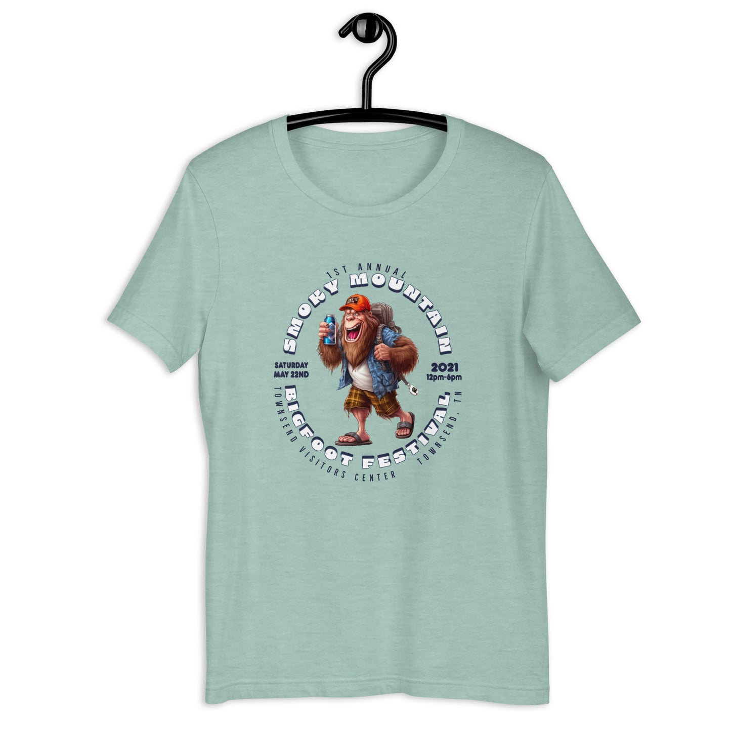 "Get your hands on our exclusive Smoky Mountain Bigfoot Festival 2021 t-shirt! Featuring a cool cryptid design, this bigfoot t-shirt is perfect for any bigfoot enthusiast. Show off your love for the infamous creature with our limited edition bigfoot clothing. Shop now and add this must-have bigfoot apparel to your collection!"