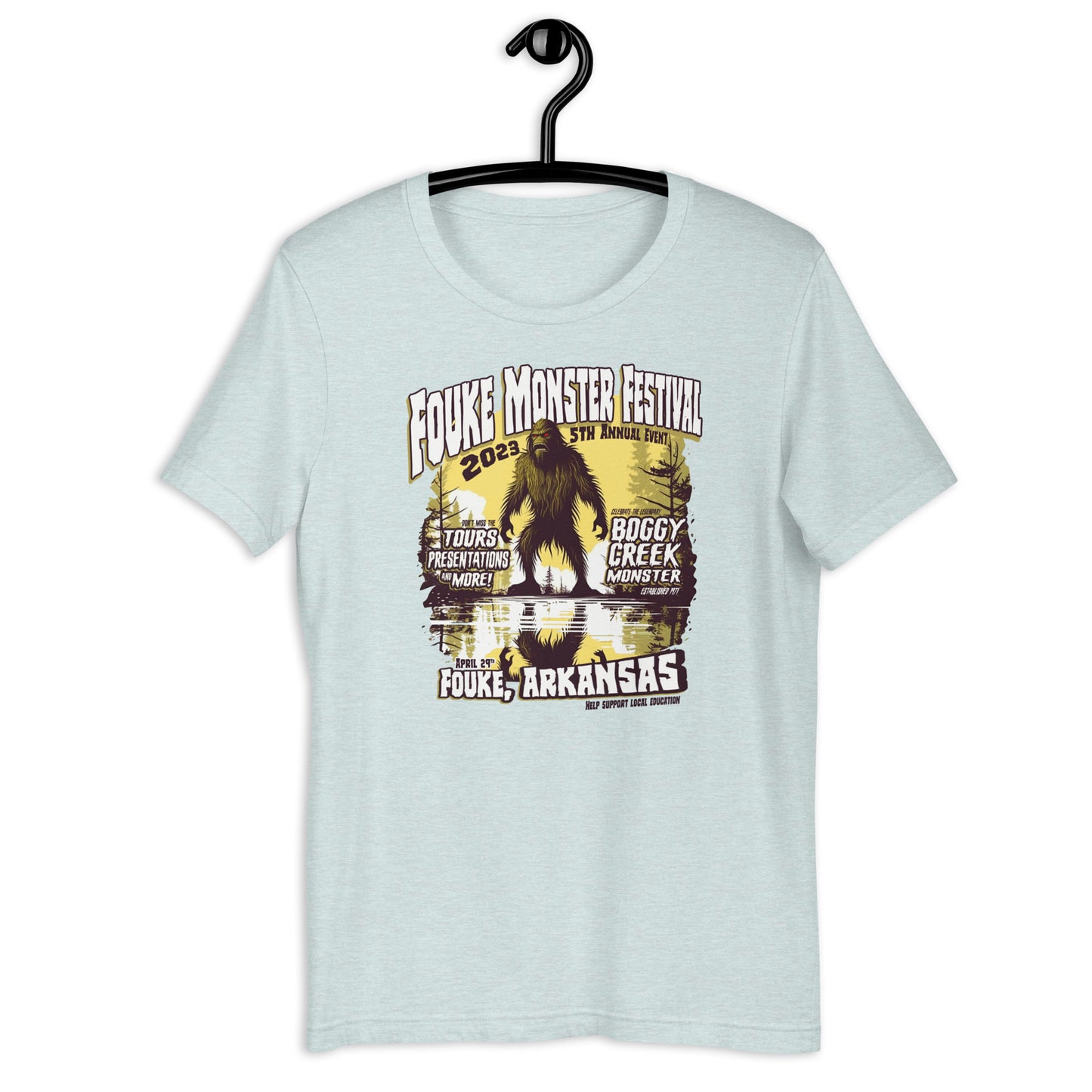 Get your hands on a one-of-a-kind Fouke Monster Festival t-shirt! Our original design t-shirt features the infamous Boggy Creek Monster and is perfect for fans of all things cryptid. Show your love for all things weird with our cryptid clothing and apparel.