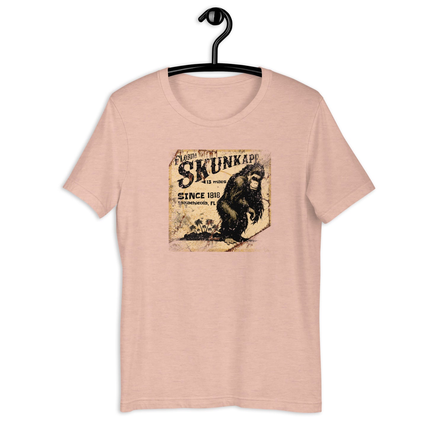 If you're a fan of cryptids and Florida folklore, you'll love the 1818 Skunk Ape cryptid t-shirt. Crafted from the highest-quality materials, this skunk ape t-shirt is both comfortable and durable. Whether you're on the hunt for the elusive creature or just want to show off your love for the legend, this cryptid apparel is the perfect choice. Invest in a piece of Florida history and order your t-shirt today!